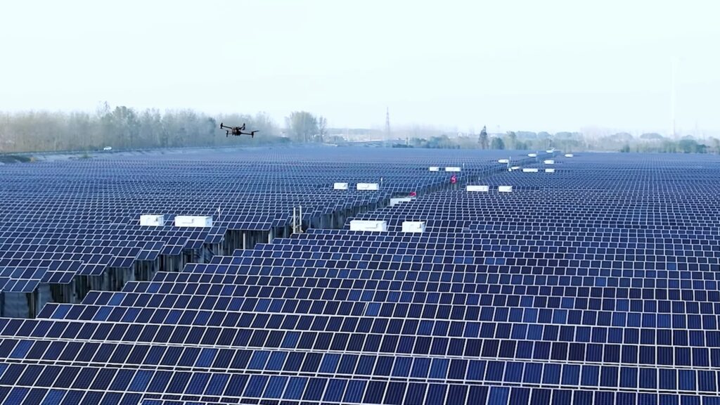 An image of the M30T hovering over a solar farm