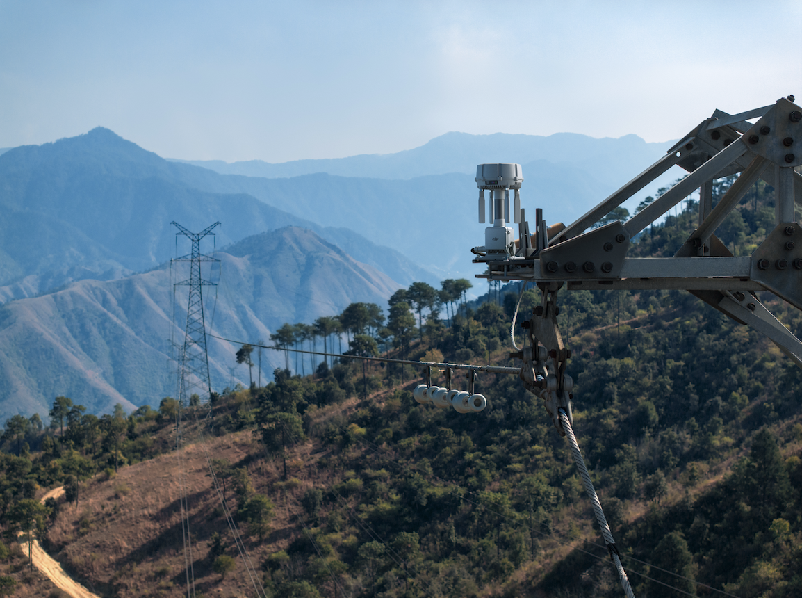 An O4 Ground Station placed on top of a transmission tower for remote region connectivity. | Image Credit: DJI