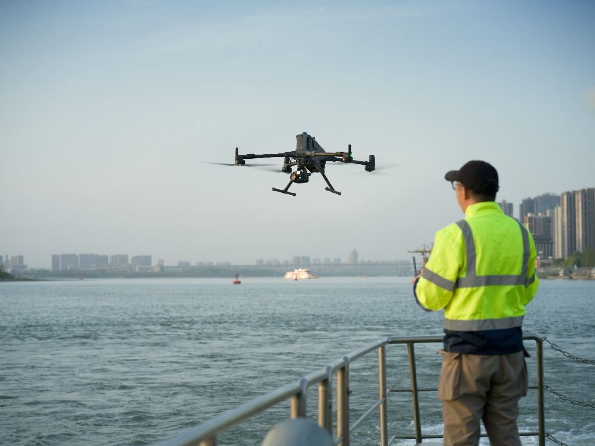 A pilot with a controller engaged in maritime operations